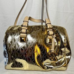 MICHAEL KORS Grayson medium Satchel in metallic gold mirror signature pattern.